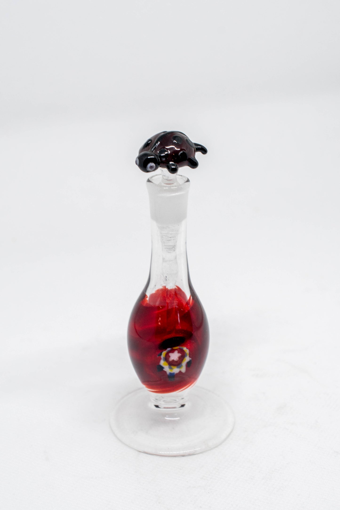 Hand Blown Glass Perfume Bottle: Tiny Lady Bug with Little Star on Base