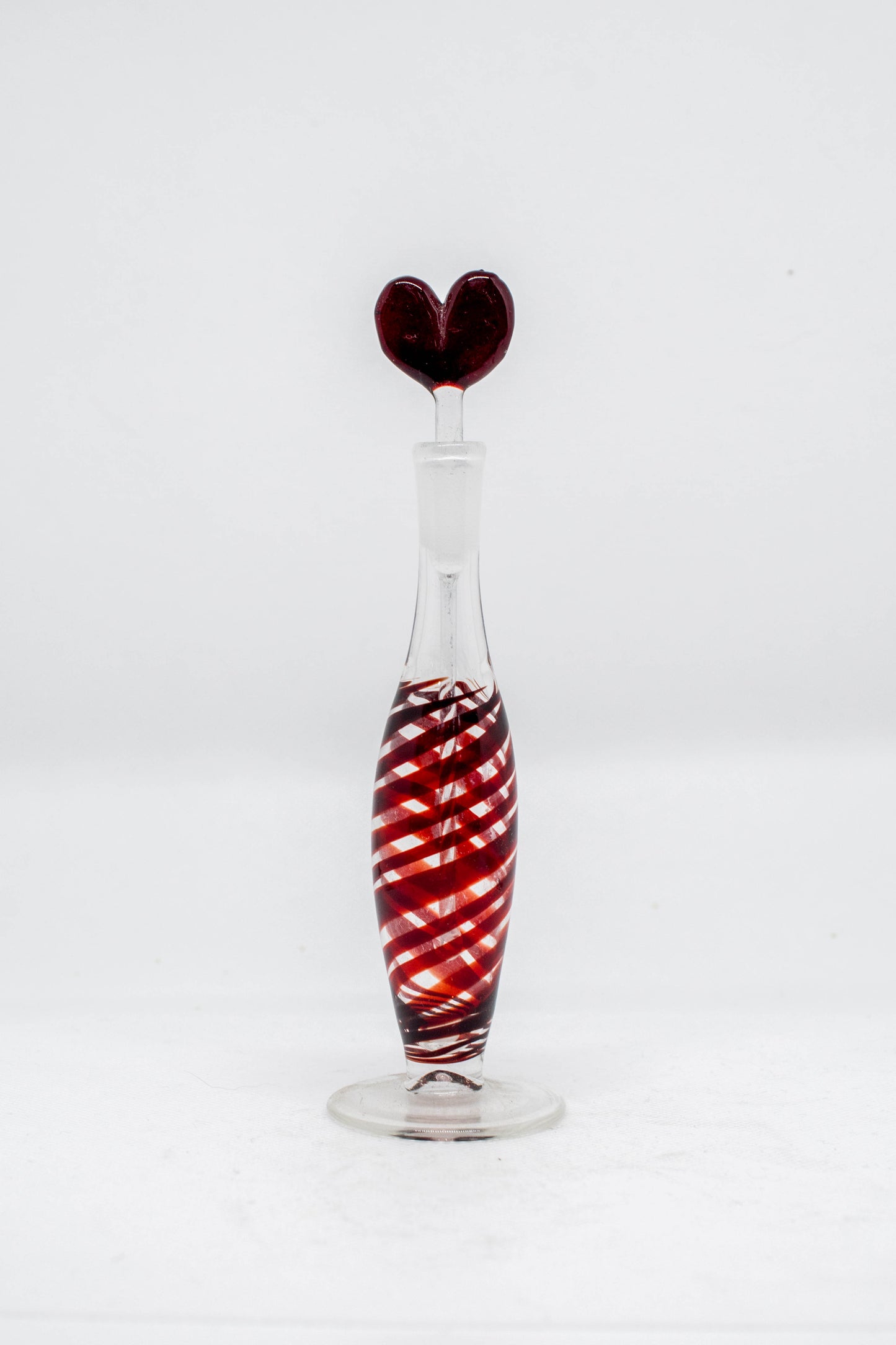 Hand Blown Glass Perfume Bottle: Dark Red Heart with Red Swirls Base